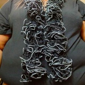 59 inch Sashay ruffle scarf in black with silver trim